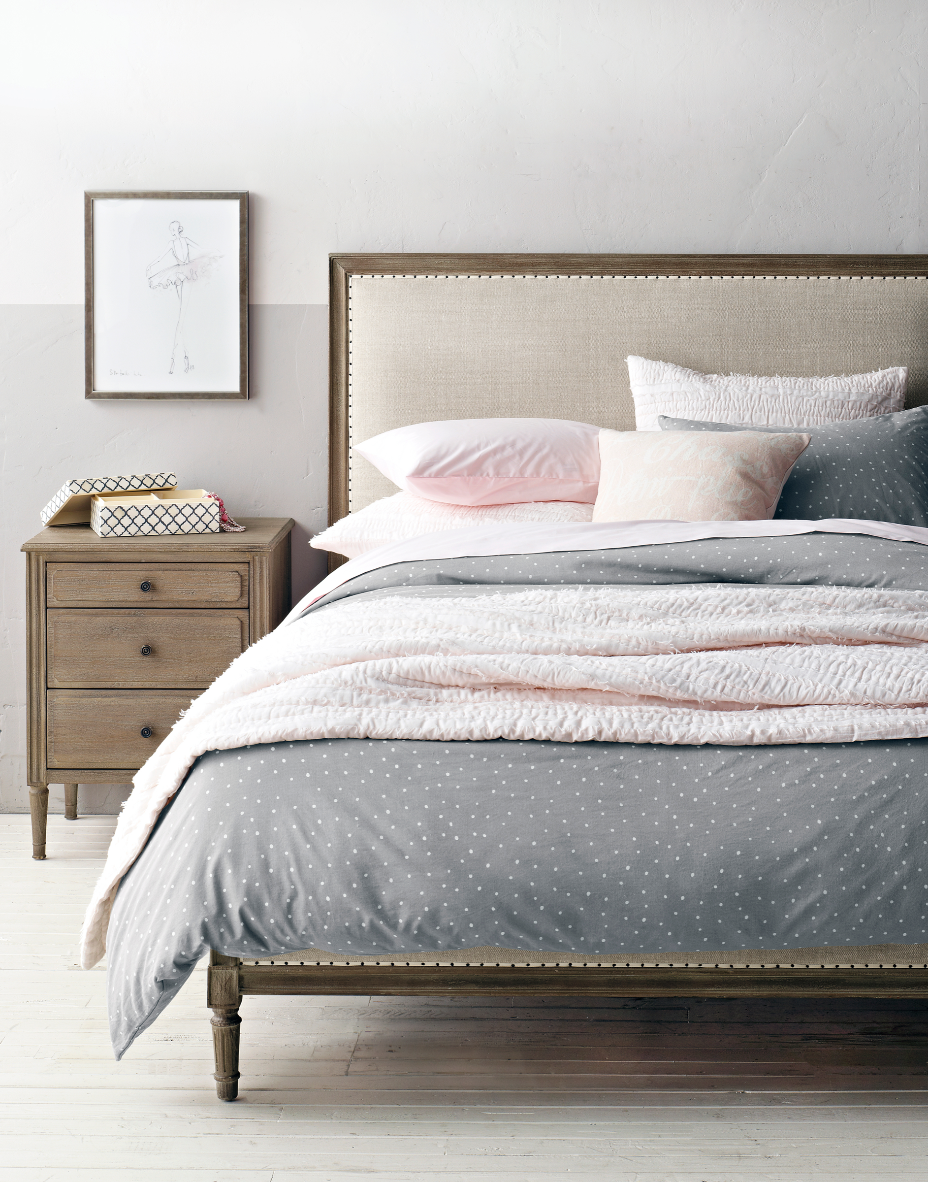 Dotted voile duvet cover and shams in grey, styled on a girl's bed