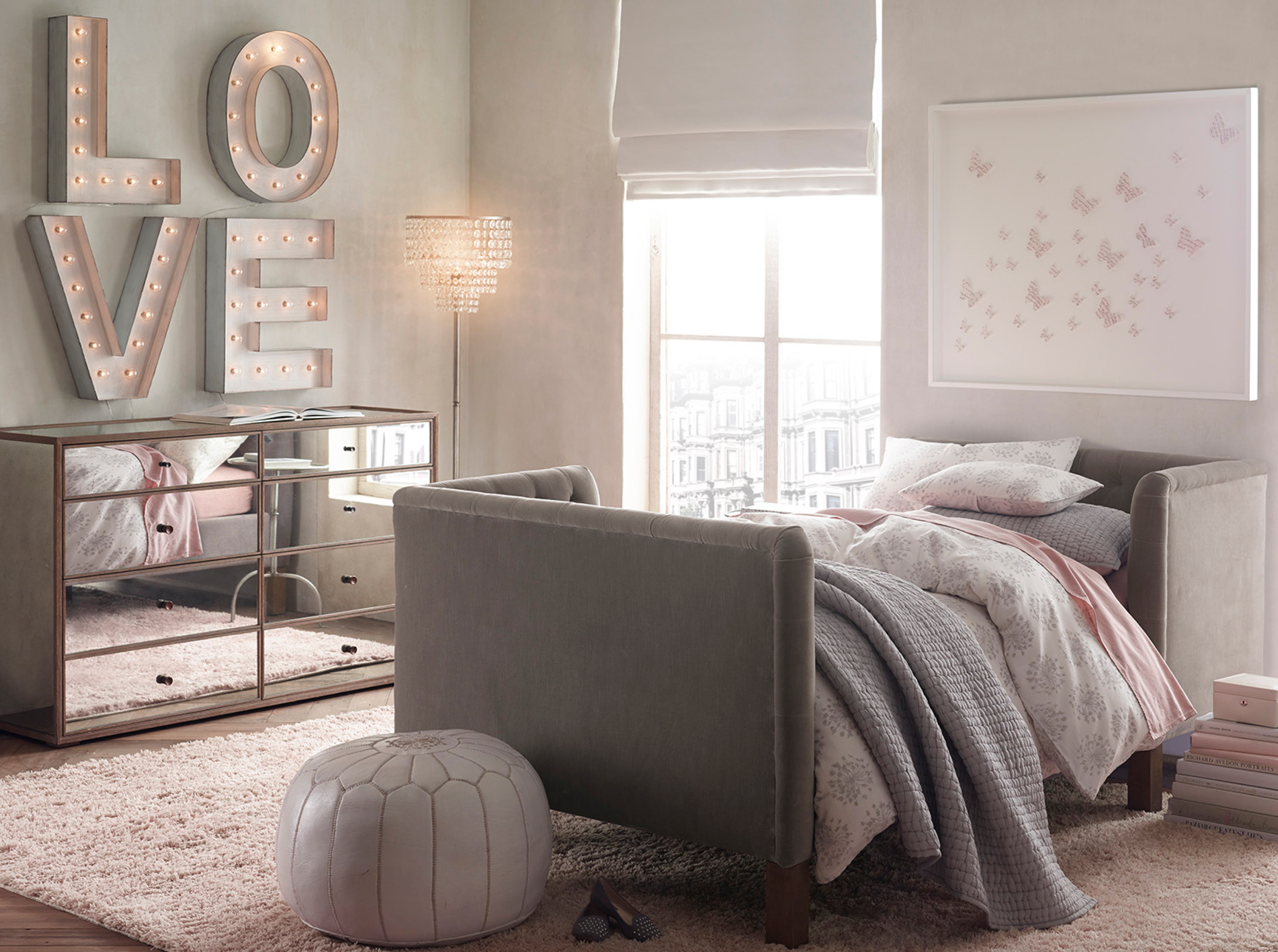 Girl's bedroom, LOVE marquee letters, mirrored dresser, pink accents